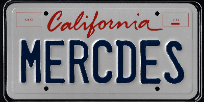 A california license plate with the word " mercedes " written in red and blue letters.