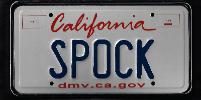 A close up of the license plate of a car.