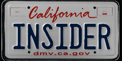 A california license plate with the word " inside ".