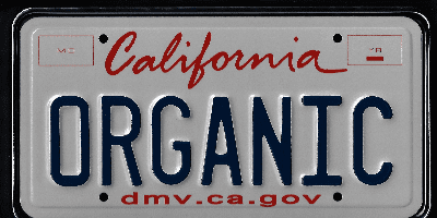 A california license plate with the word organic written on it.