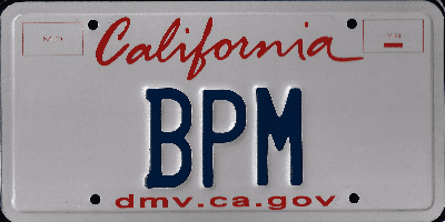 A california license plate with the word " bpm " written on it.