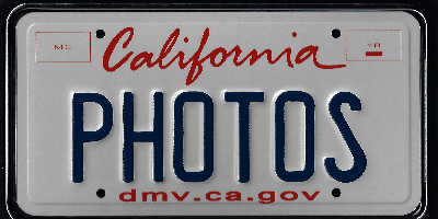 A california license plate with the word " photos ".