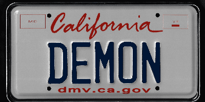 A california license plate with the word " demon " on it.