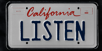 A california license plate with the word " listen " written on it.