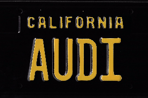 A black and yellow california license plate.