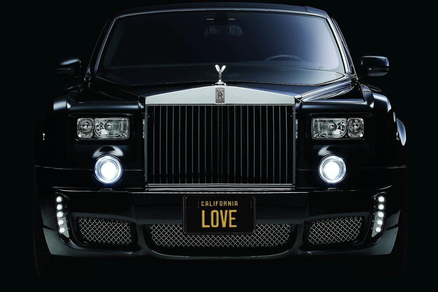 Black luxury car front with LOVE plate